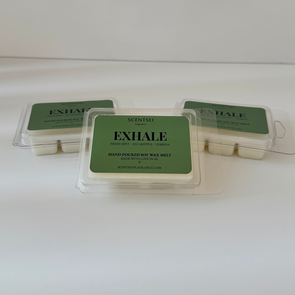 Three Scentsei Fragrance wax melts labeled 'EXHALE' on a white background