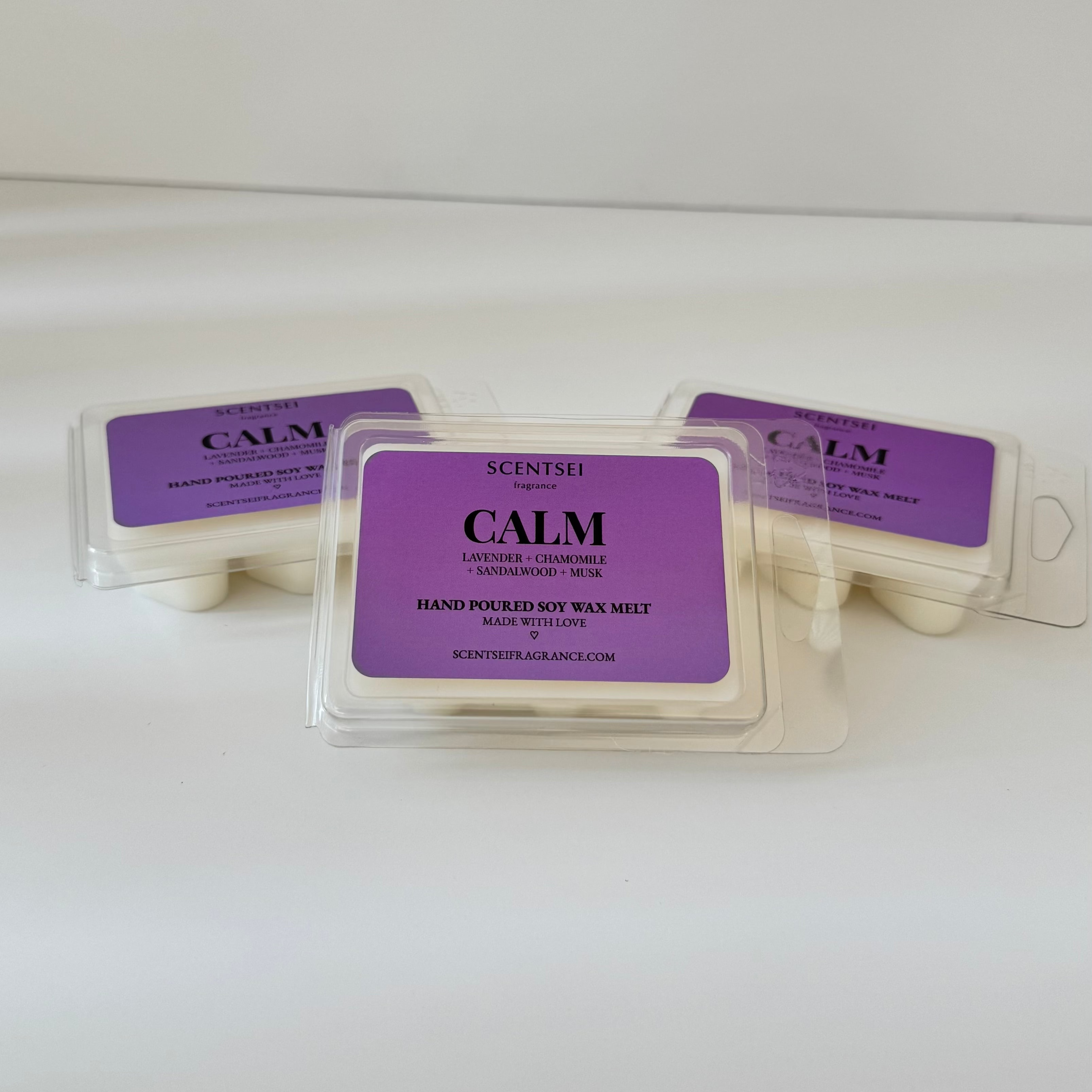 Three Scentsei Fragrance wax melts labeled 'CALM' on a white background